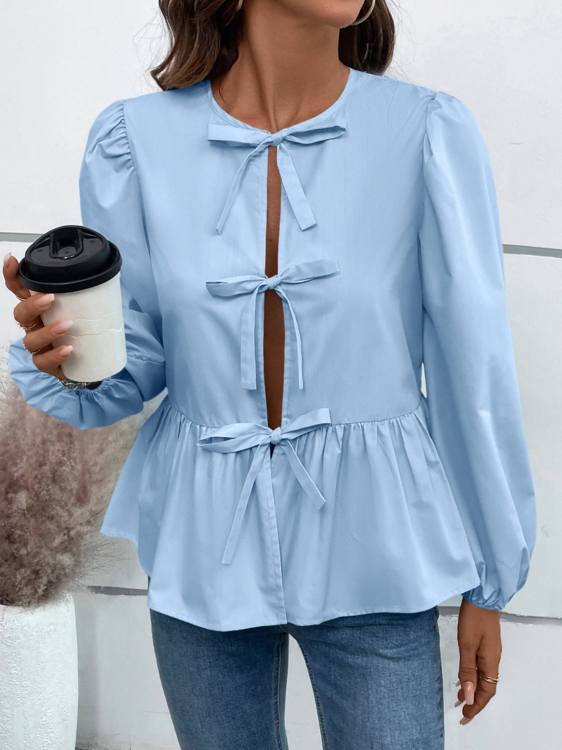 Leopard Peplum Tied Long Sleeve Blouse