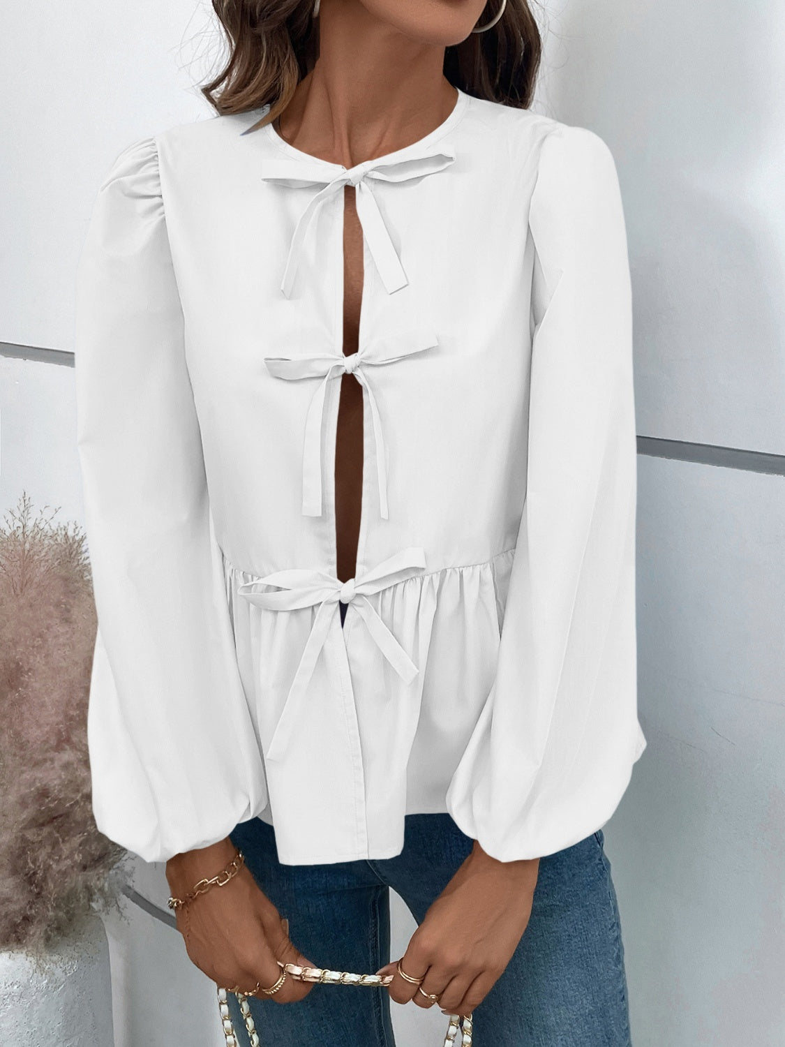 Leopard Peplum Tied Long Sleeve Blouse