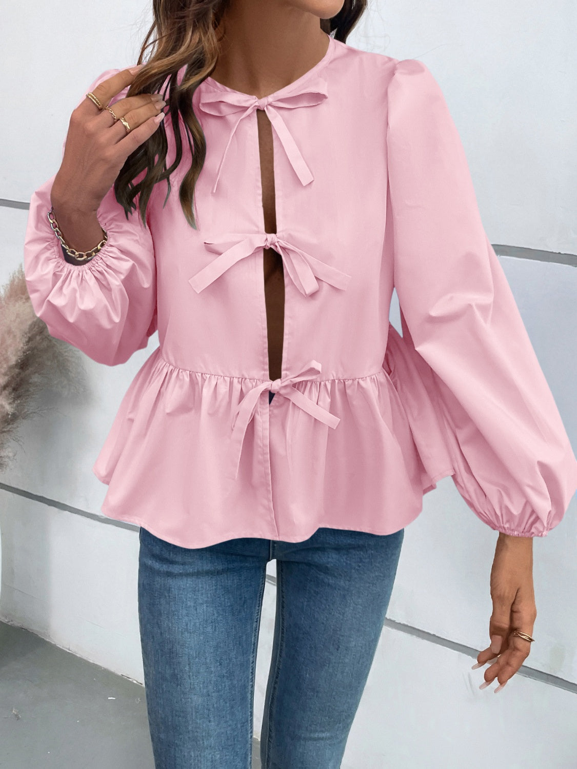 Leopard Peplum Tied Long Sleeve Blouse