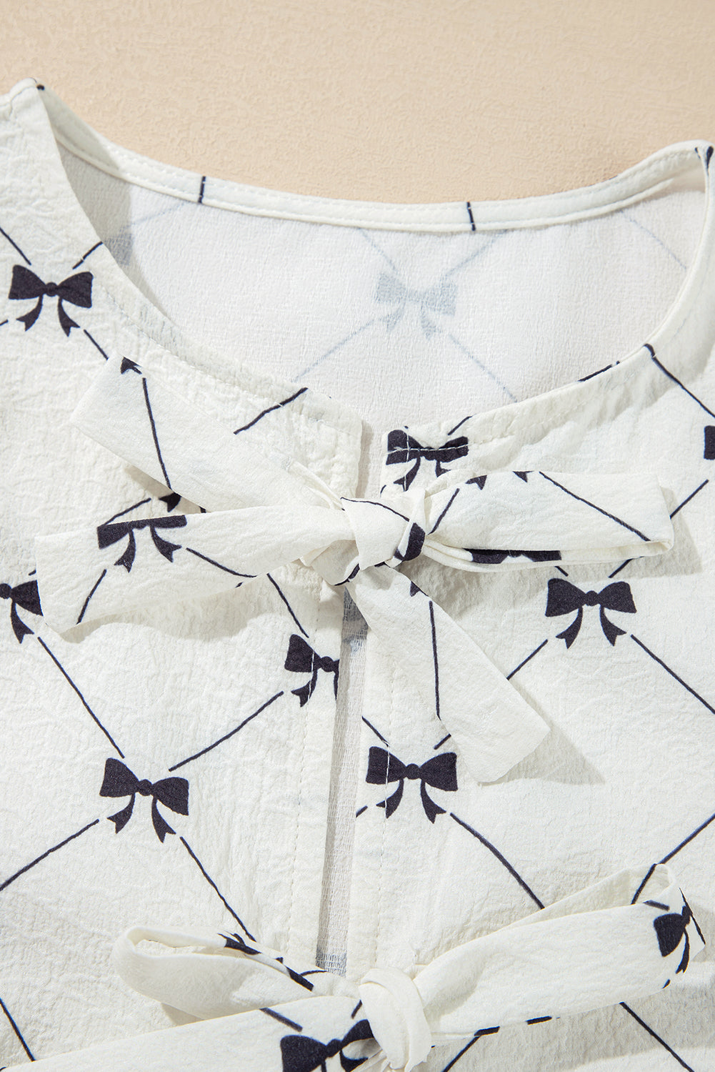 White Bow Print Front Tie Bubble Half Sleeve Blouse