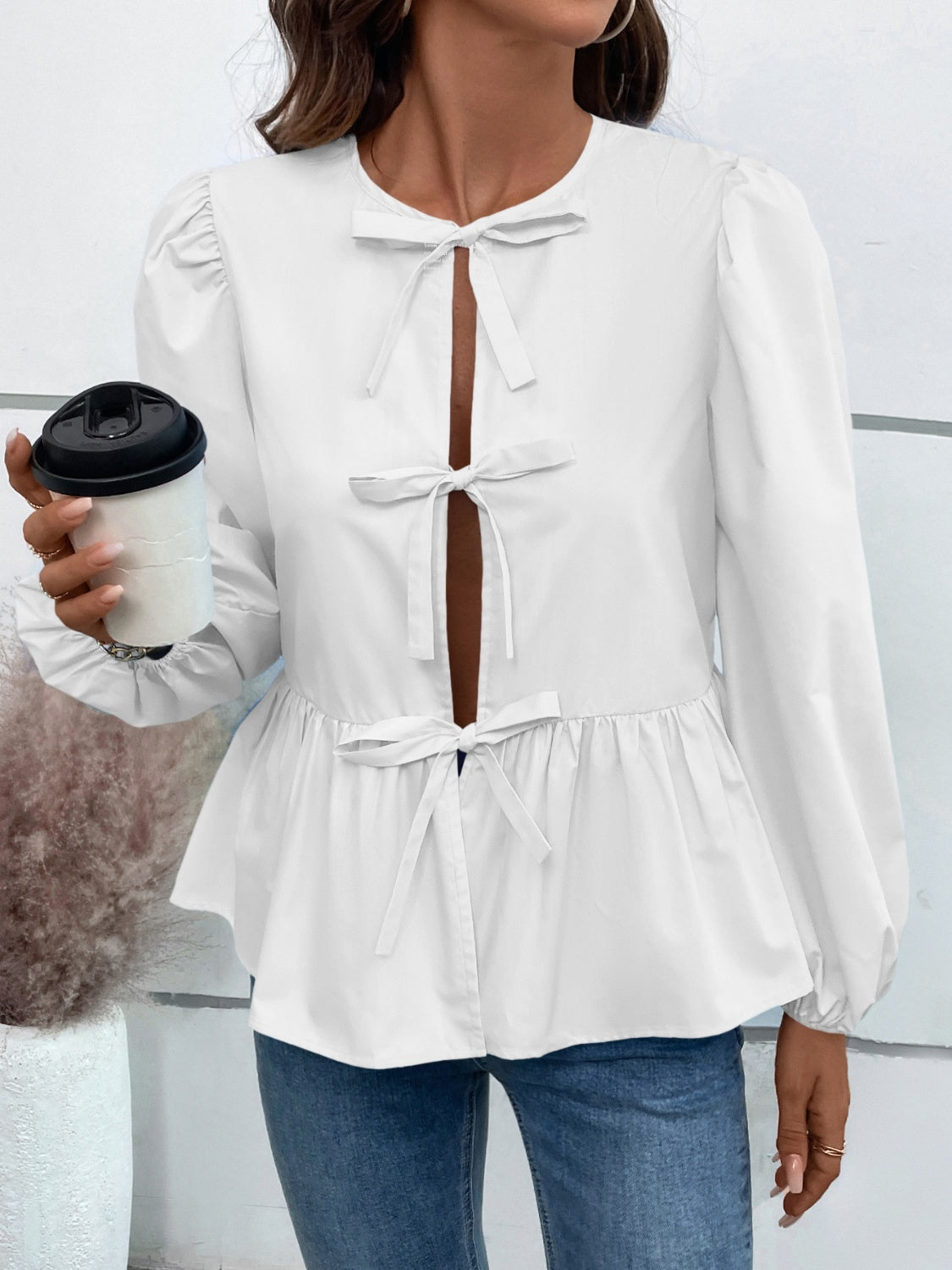 Leopard Peplum Tied Long Sleeve Blouse