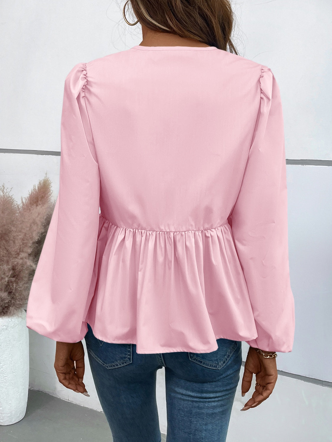 Leopard Peplum Tied Long Sleeve Blouse