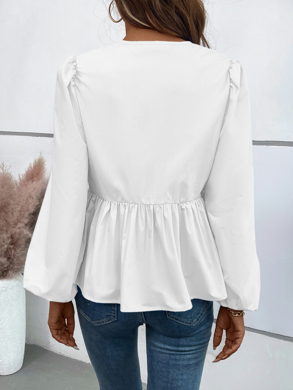 Leopard Peplum Tied Long Sleeve Blouse