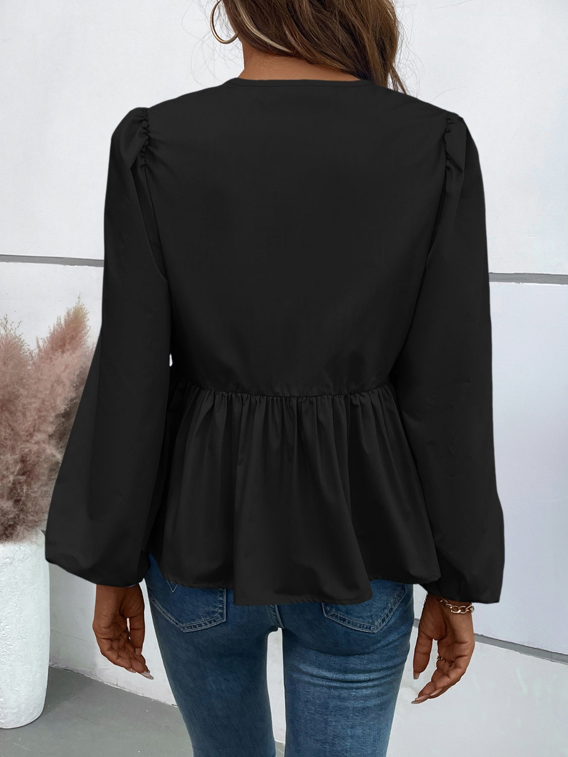 Leopard Peplum Tied Long Sleeve Blouse