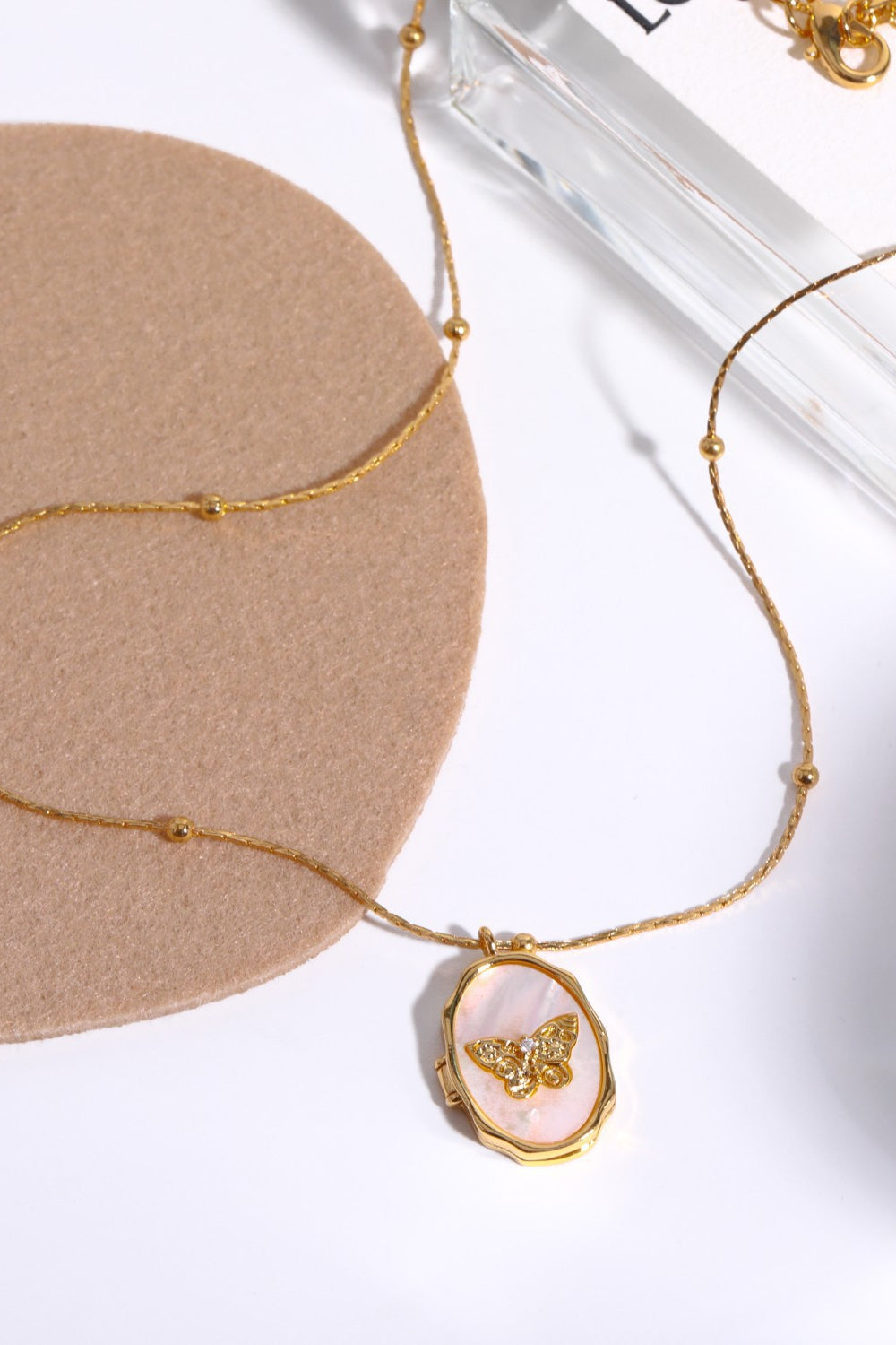 Gold Plated Shell Inlayed Butterfly Locket Necklace - Bazaare Mart