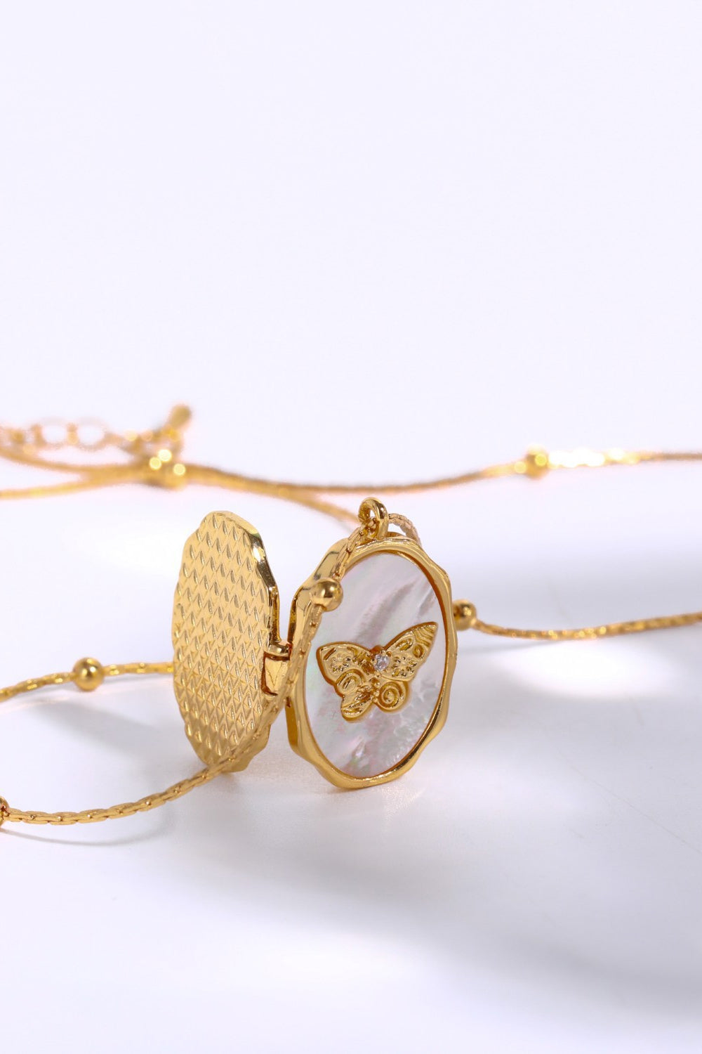 Gold Plated Shell Inlayed Butterfly Locket Necklace - Bazaare Mart