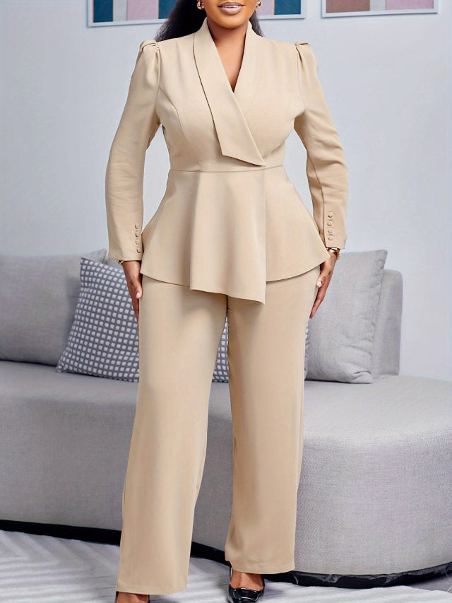 Woman wearing a beige suit standing in a living room.