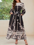 Printed Round Neck Long Sleeve Maxi Dress with Pockets Black Trendsi Printed Round Neck Long Sleeve Maxi Dress