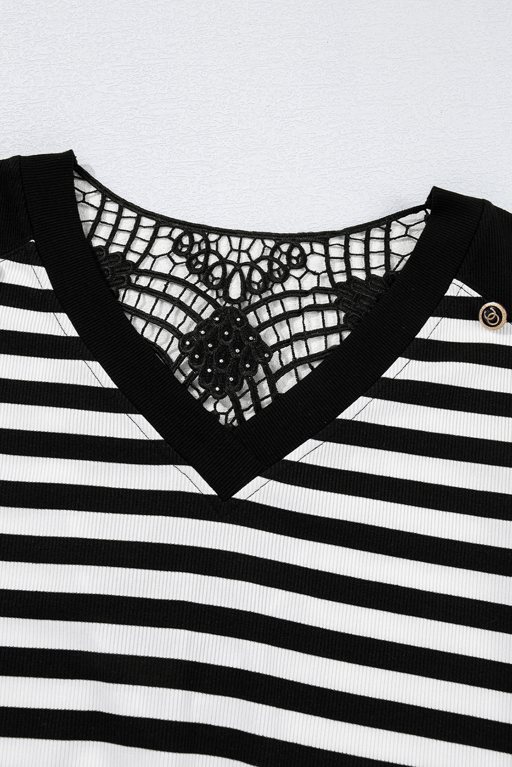 Black and white striped top with lace detailing 