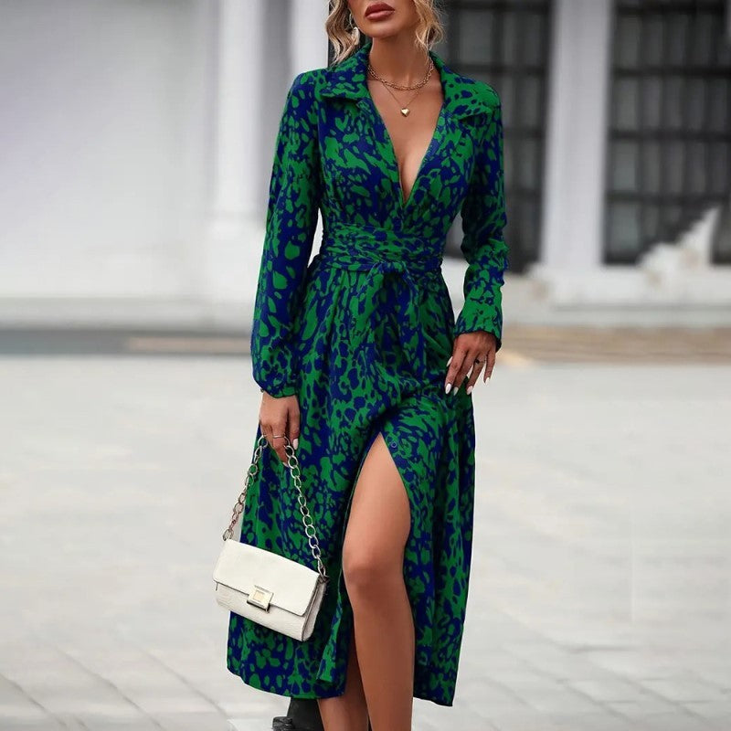 Woman wearing a green and blue patterned dress 
