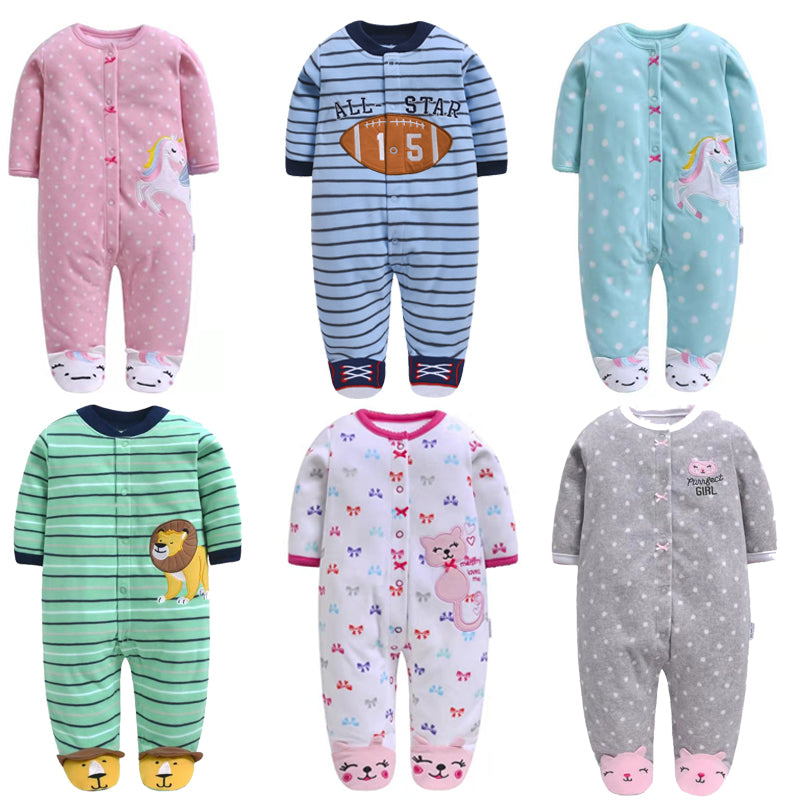 6 colors and designs of one piece PJs. Pink Polka Dot Unicorn, Blue Striped Football, Aqua Polka Dot Unicorn, Green Striped Lion, White & Pink With Butterflies and a Cat, Gray with Pink Polka Dots and a Cat