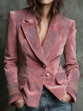 Pink blazer with two gold buttons, intricate patterns on the shoulders, lapel cuffs and pocket flaps