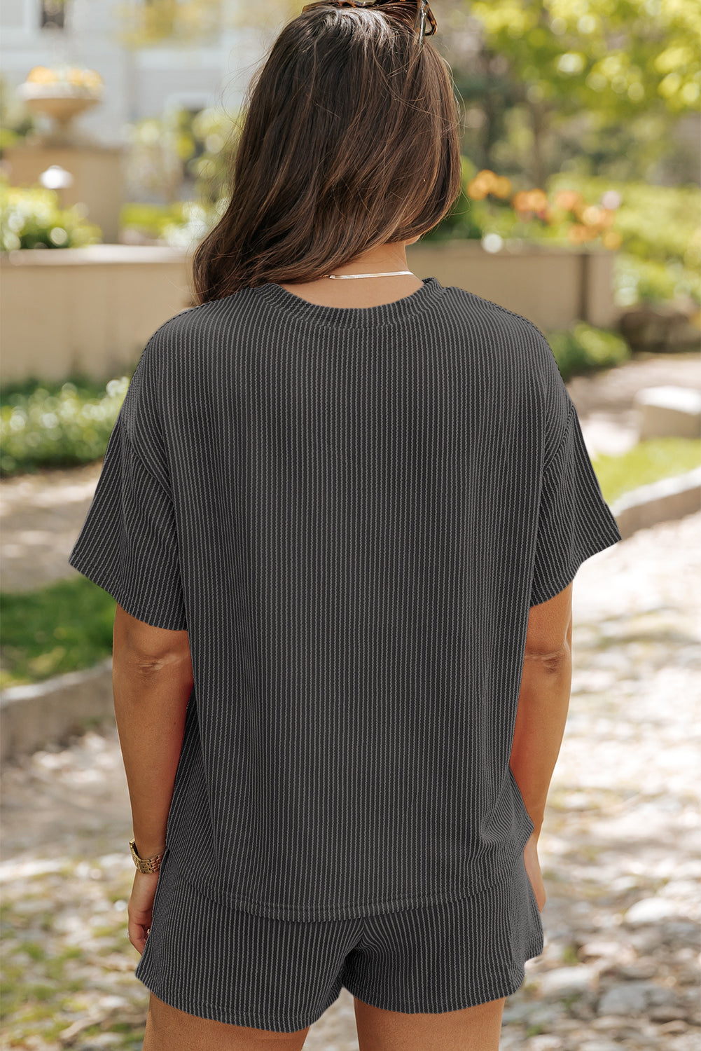 Back of Carbon Grey Ribbed Textured Knit Loose Fit Round Neck Half Sleeve Tee and Pocketed Shorts Set