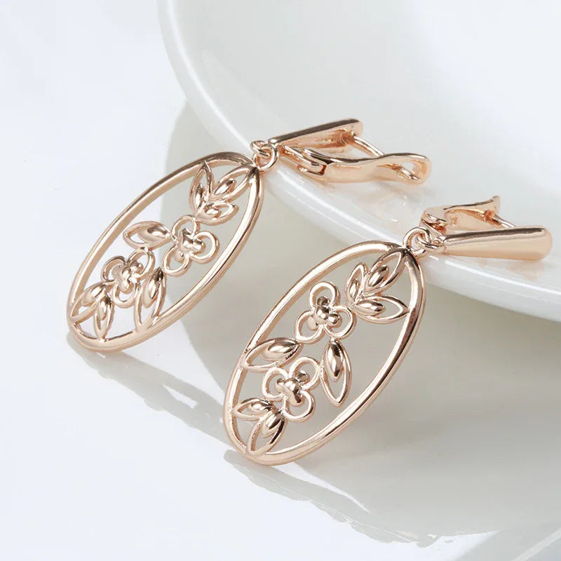 French Retro Hollow Oval Flower Earrings Bazaare Mart Hollow Gold Oval Floral Dangle Earrings