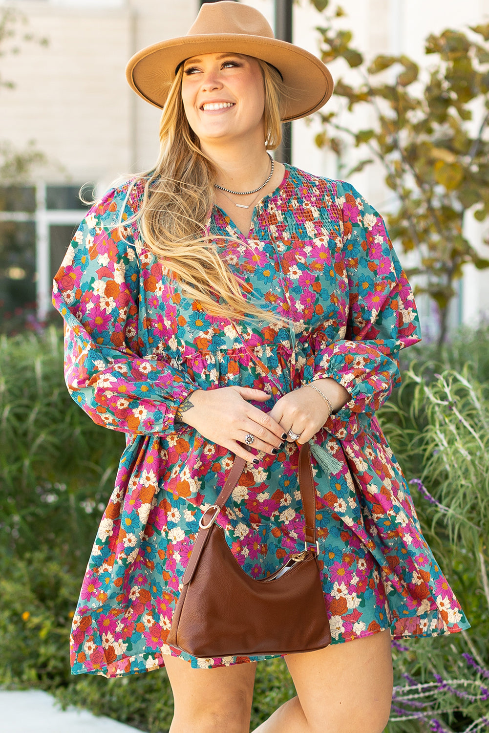 Woman wearing a colorful floral dress 