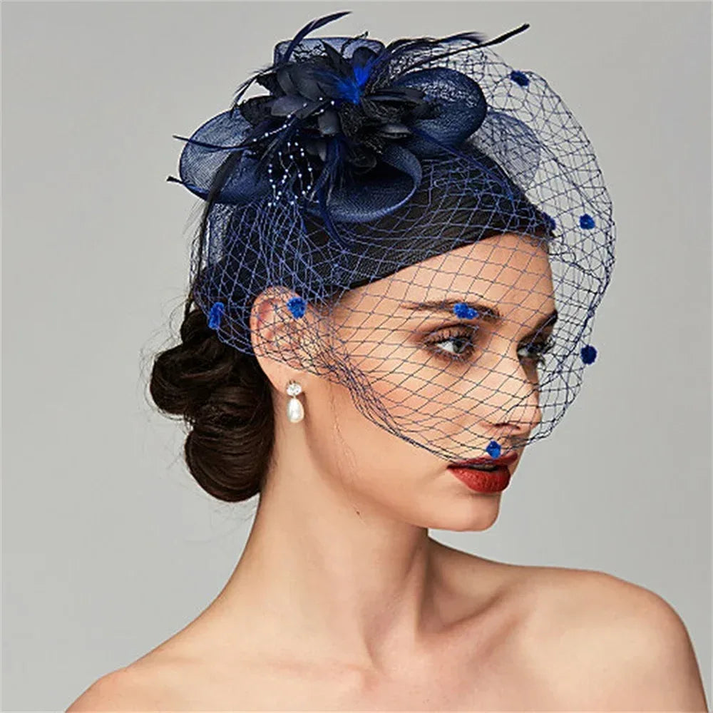 Woman wearing a navy blue floral headpiece with a veil 