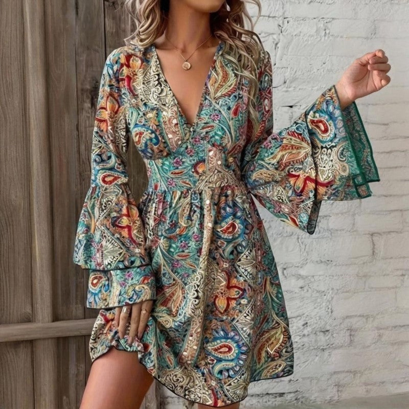 Woman wearing a colorful patterned dress with bell sleeves