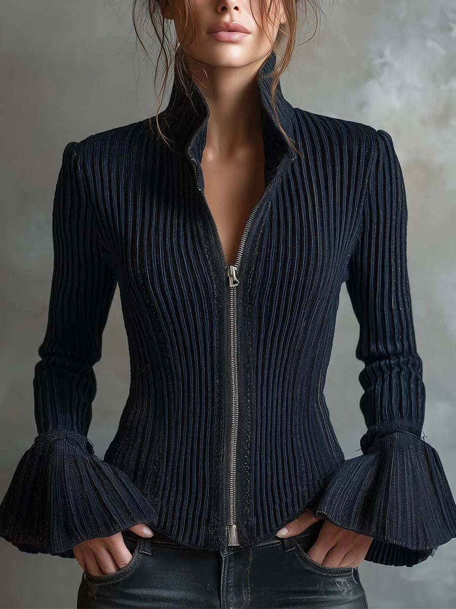 Black ribbed sweater with bell sleeves worn by a model against a neutral background