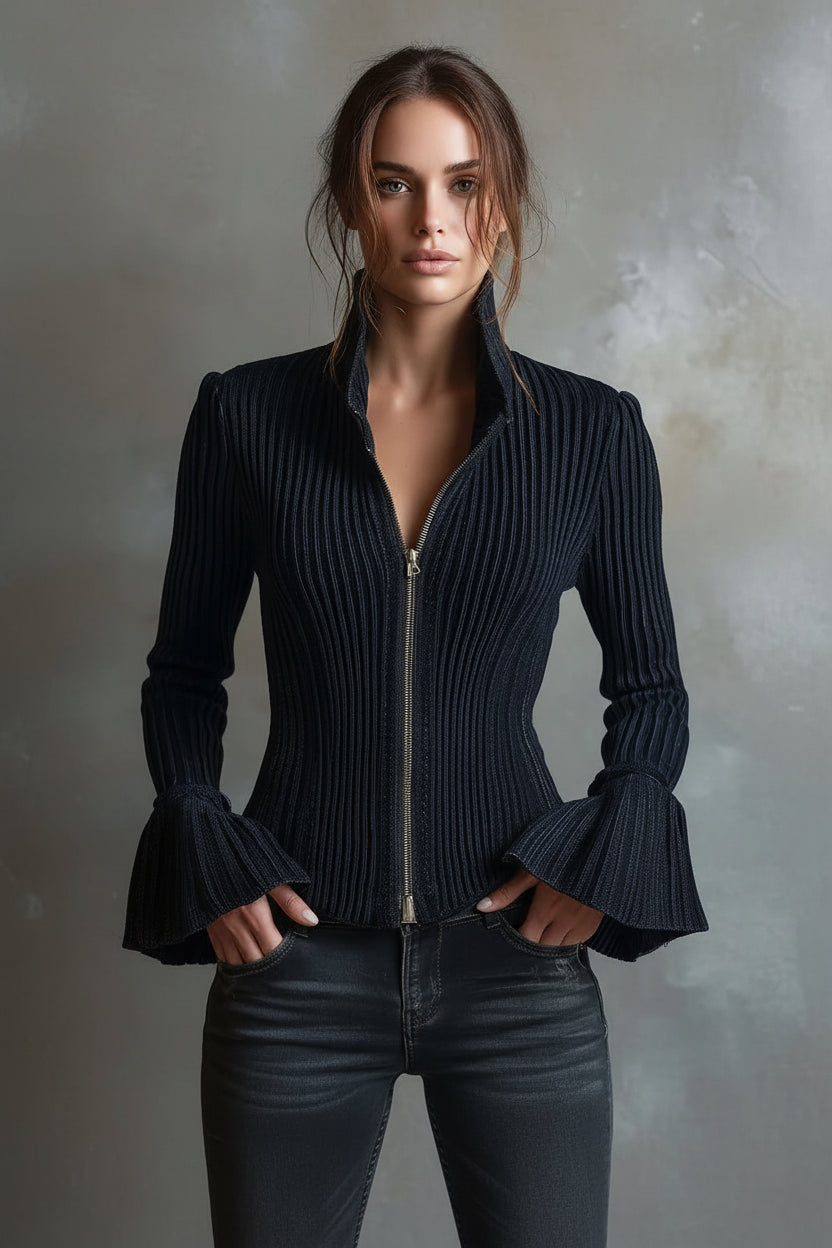 Navy ribbed sweater with bell sleeves worn by a model against a neutral background