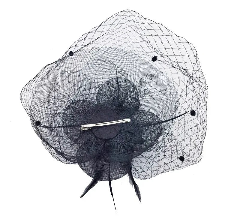 Black floral hair accessory with a netting design 