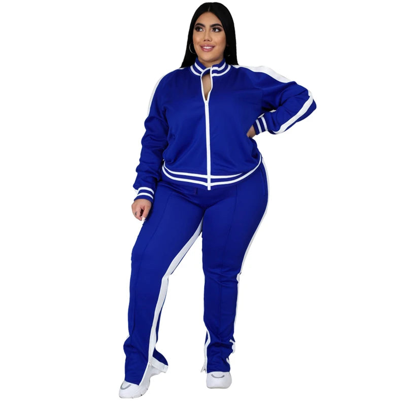 Woman wearing a blue tracksuit with white accents 