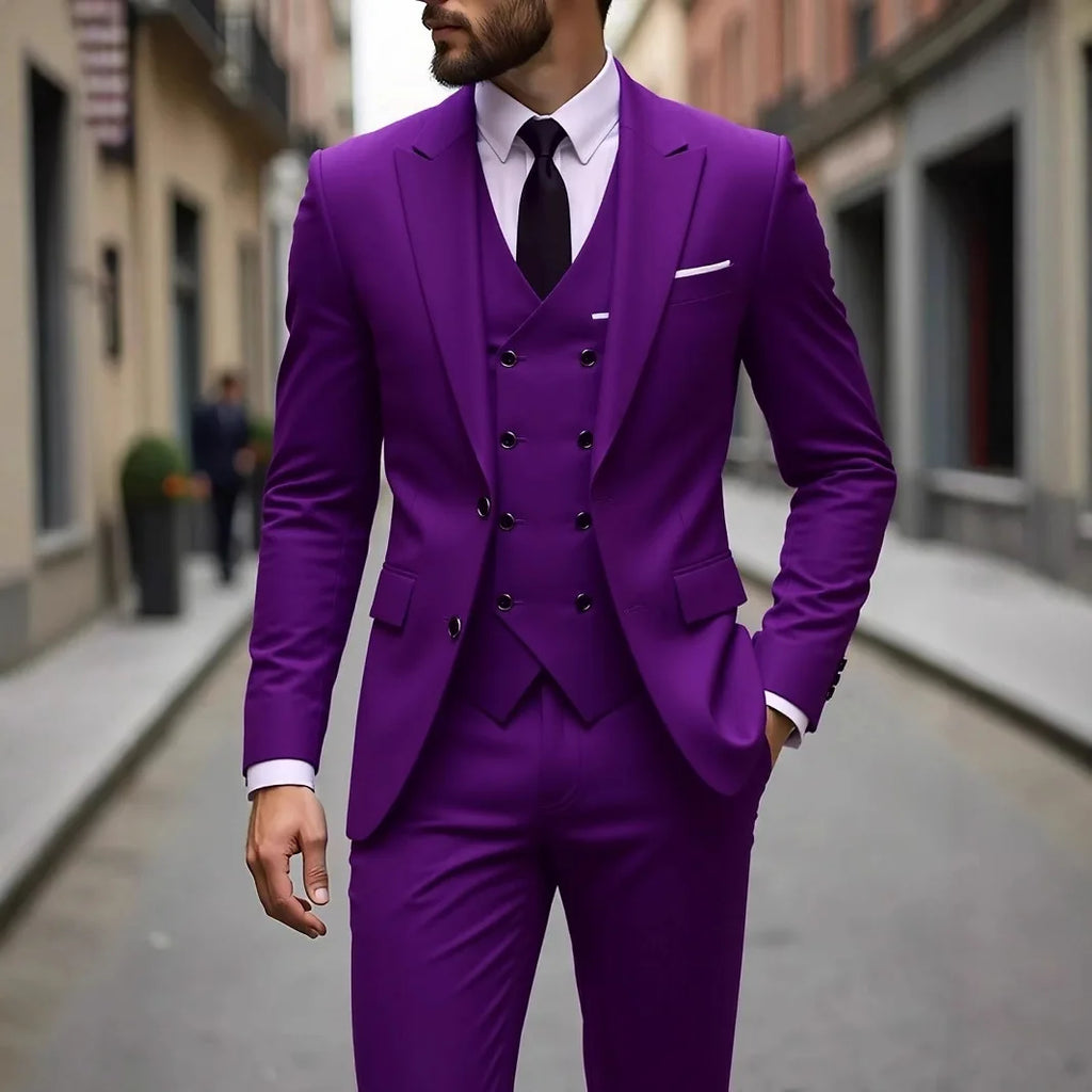 Man wearing a purple suit with a black tie on a city street.