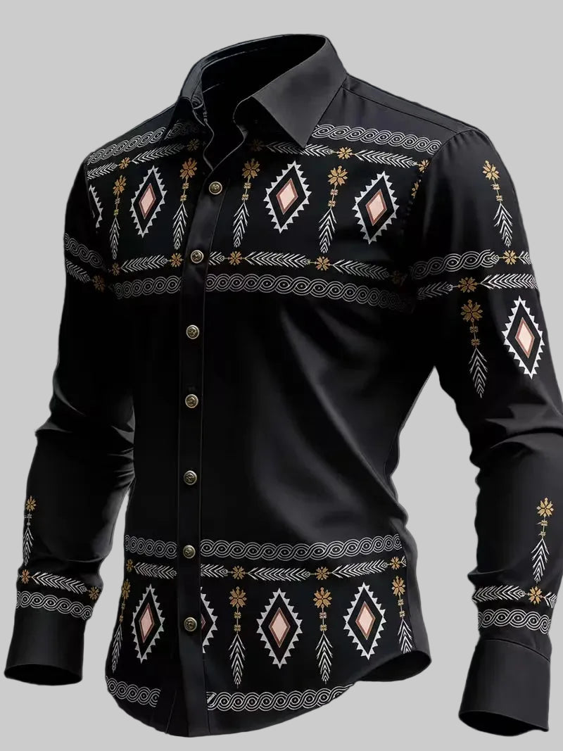 A black long-sleeve button-up shirt with intricate geometric and tribal-style embroidery in white, gold, and light pink, displayed on a dark background.