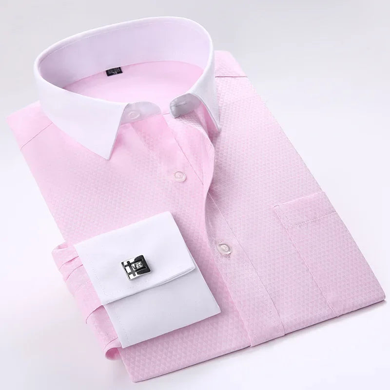Pink dress shirt with white collar and cuffs on a light gray background