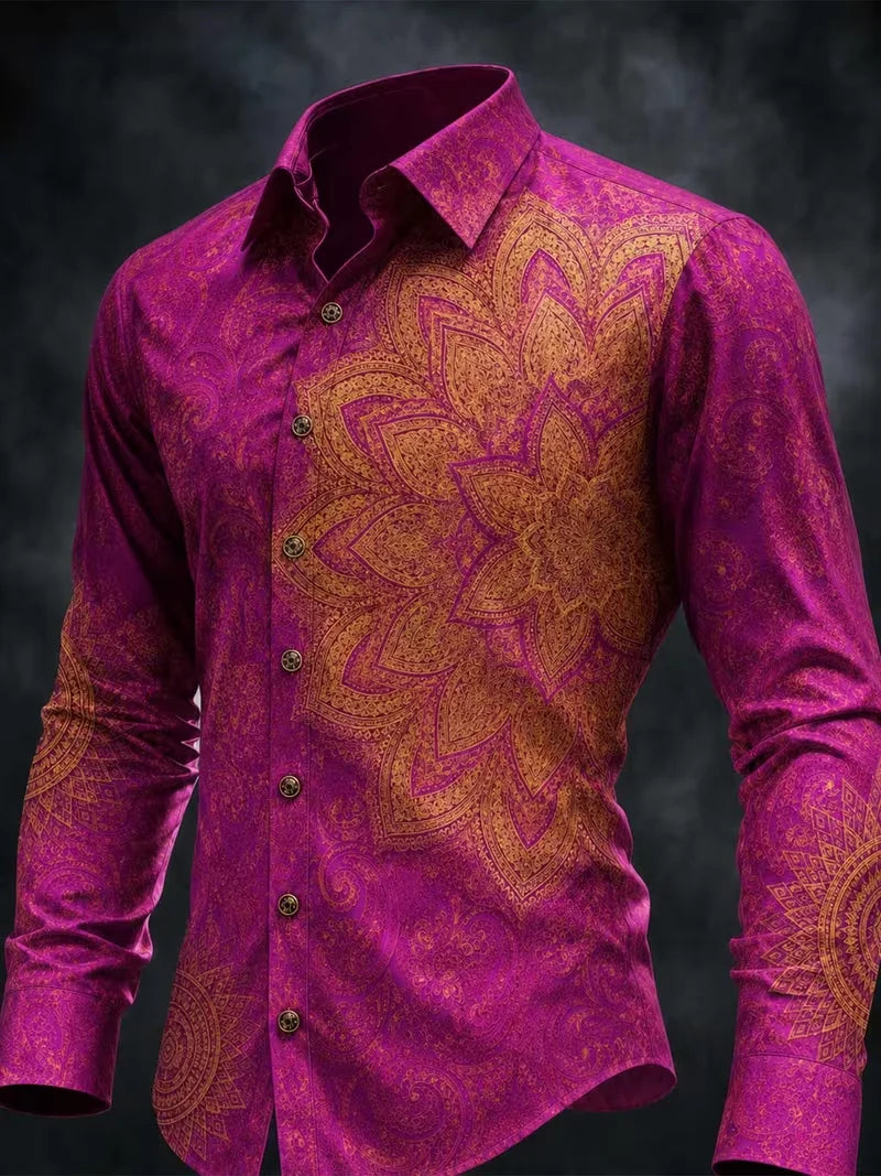 A men's long-sleeve button-up shirt in magenta with a large golden mandala pattern on the chest and sleeves, displayed on a headless mannequin torso against a dark textured background.