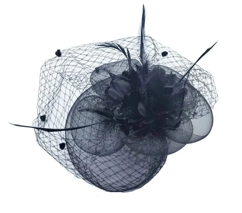 Black decorative hair accessory with netting and feathers 