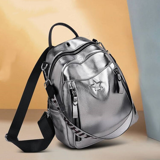 Silver backpack with star design 