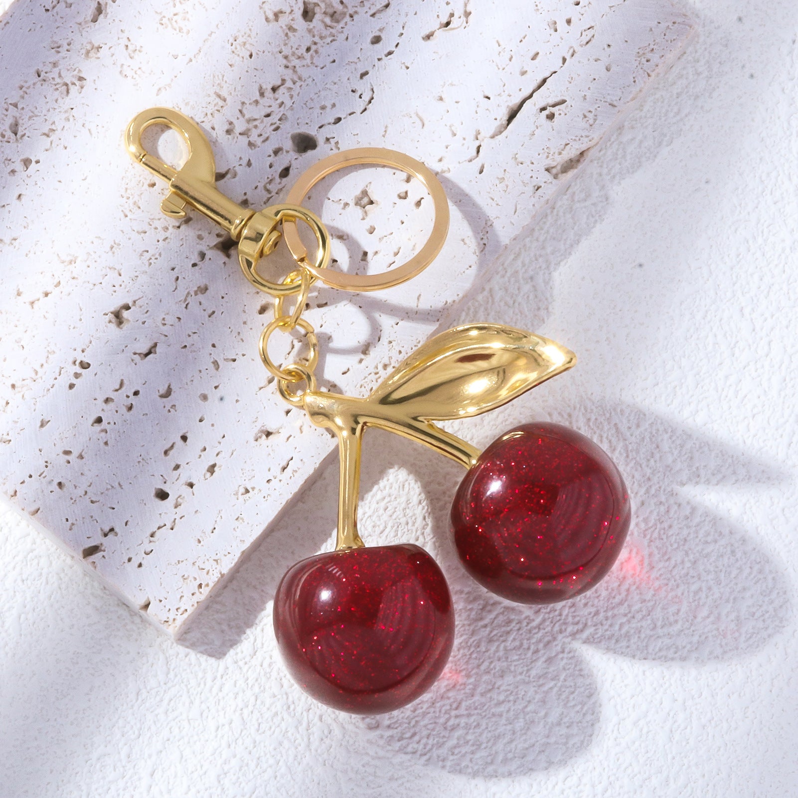 Glittery Cherry-shaped keychain with gold stem and Leaf with Ring and Hook
